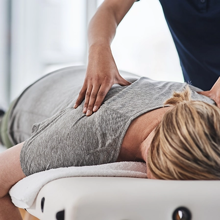 Patient receiving a chiropractic adjustment at iMED Downtown LA