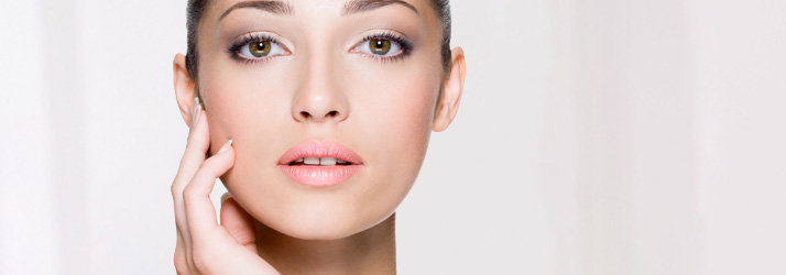 Pain-Free Spa Lady Touching Face